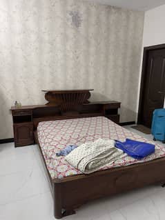 Used wooden bed