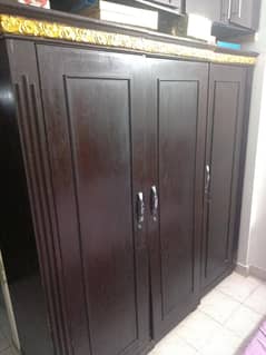 wooden Big size 3 door almari dark brown colour