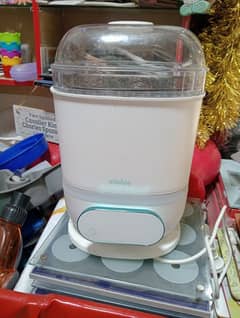 a Minbie Steriliser & Dryer,