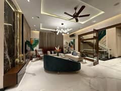 A PRIME LOCATION 2 KANAL BRAND NEW HOUSE FOR SALE IN SHAHEEN BLOCK SECTOR B BAHRIA TOWN LAHORE