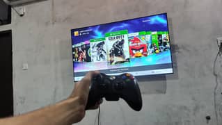XBOX 360 and 2 WIRELESS CONTROLLERS