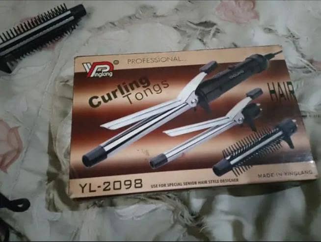 curling rod in new condition only box open, condition 10/10 0
