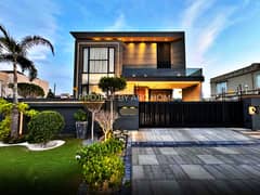 Luxurious 1 Kanal Modern Bungalow In Phase 6 With A Full Basement, Private Pool, And State-Of-The-Art Home Theater.