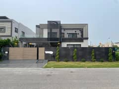 100% Orignal Images One Kanal Brand New Modern Design Bungalow For Rent DHA Phase 6 Lahore.