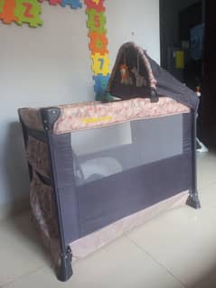 baby cot and playing crib, pack and play