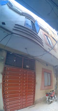 1.5 Marla house for sale at Main Road Hassan Town