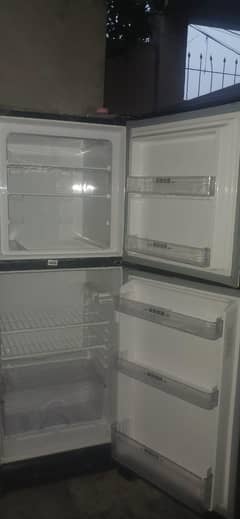 12 cubic refrigerator with 10/10 condition for urgent sale