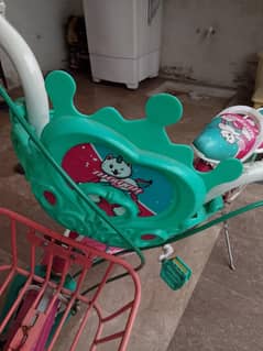 A brand new pink Barbie cycle for girls