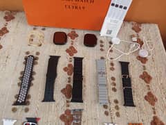 Ultra Watch with  2 Metal Case  10 Straps 2 Charging Cables and Cover