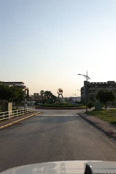 Today Hot Deal Plot for sale Sector C Boulevard Possession Utility Paid Very Reasonable Price Solid Land Back open With Green Patch Near to Main Entrance Bahria Enclave Islamabad