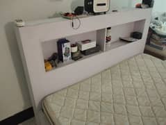 Double bed with built-in bookcase