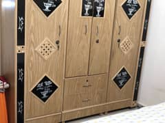 Wooden bed and 3 almari