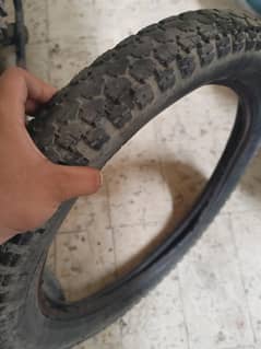 125 front and back tyre with new front tyre tubr