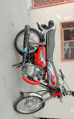 125 new condition red colour