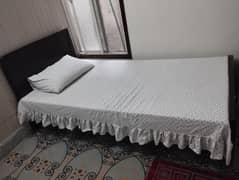 Used Wooden Single Bed for Sale – Good Condition!