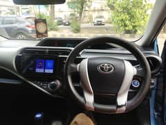 Toyota Aqua steering Multymadia button available