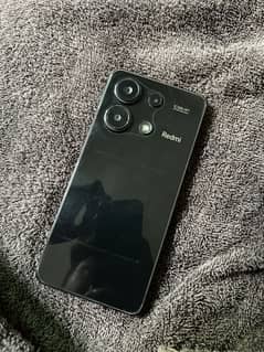 I am selling redmi note 13 8gb vs 256 gb condition 10 by 10 ha
