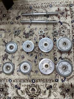 Perfect condition Total 12kg (2kg 4 plates - 1Kg 4 plates) + 2 bars