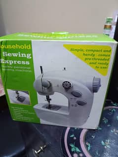 Mini Sewing Machine, used once - Negotiable alot.
