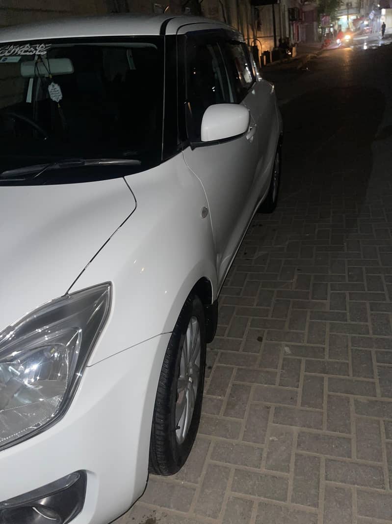 swift car white color 2022 model like new scratch less 11