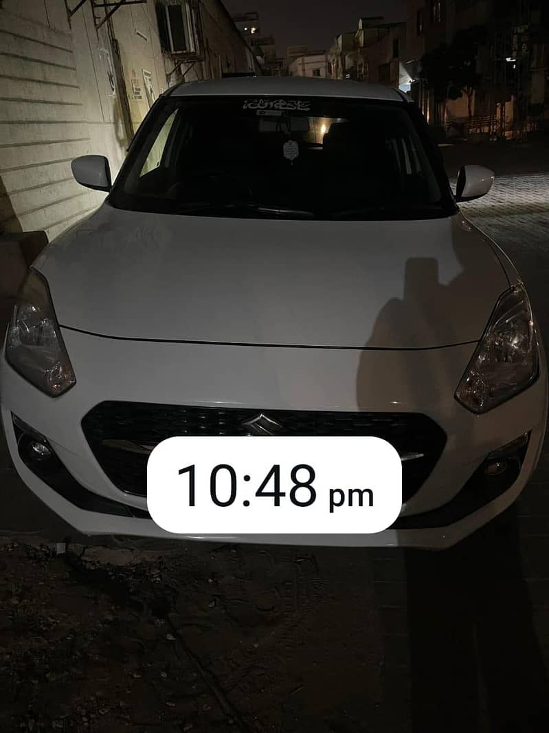 swift car white color 2022 model like new scratch less 12