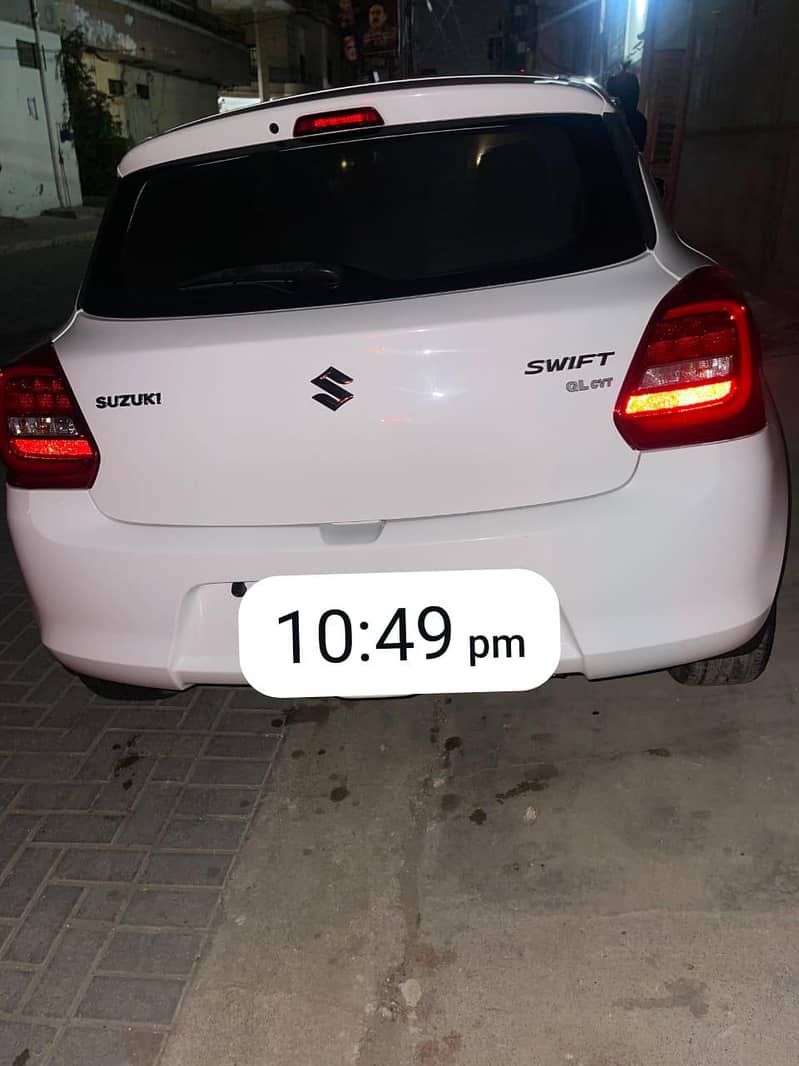 swift car white color 2022 model like new scratch less 13