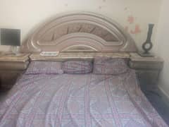 king size bed with side tables and dressing table