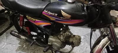 Honda c d70 total genuine 2009 model black colour Lahore