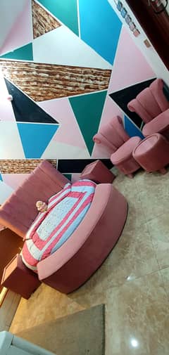 Round bed set with side tables front setti and 2 chairs with table