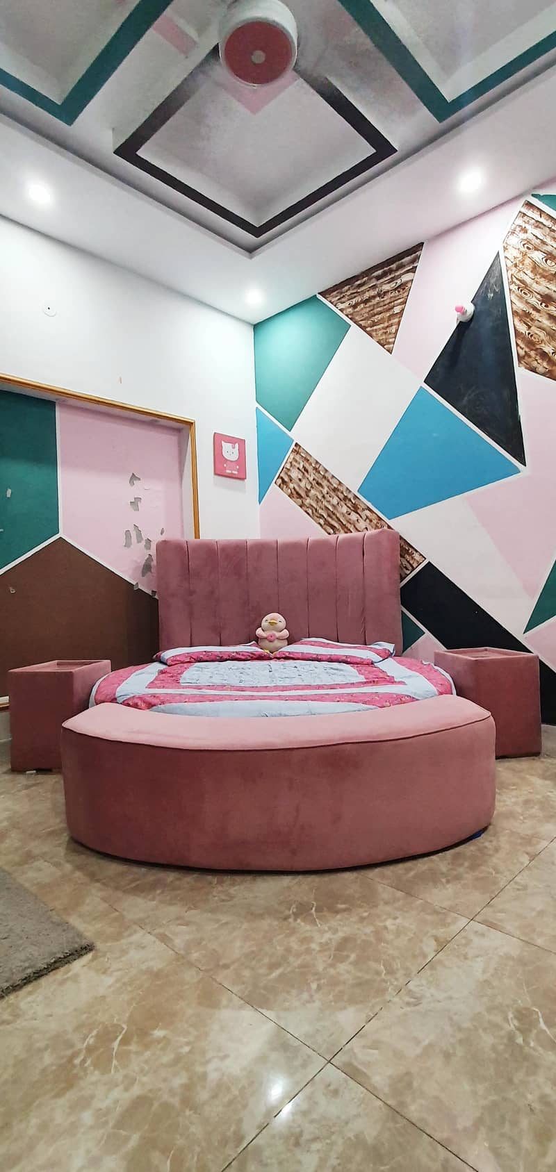 Round bed set with side tables front setti and 2 chairs with table 3