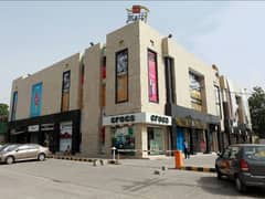 7 KANAL 3 MARLA CORNER COMMERCIAL BUILDING AVAILABLE FOR SALE at THE PRIME LOCATION OF GULBERG MAIN BOULEVARD (RENTAL WORTH 1 CRORE 61 LAC)