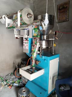 Slanty packing machine with date expiry printer