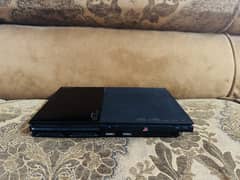 Ps2 slim with games