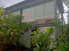 1000 Yards Purpose Built Office Use Bungalow For Rent Located In Closed Proximity To Main Shahrah-e-Faisal In Block 6 PECHS Boasting 14000 Sqft Of Carpeted Area, Cafeteria ALarge Garage