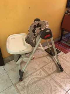 Foldable adjustable high chair with food tray