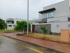 250sq yd 4 & 5 Bedrooms Luxury Villa FOR SALE. Adjacent to Jinnah Avenue, Easy access to Entrance facing GRAND MOSQUE. All facilities nearby and utilities present.