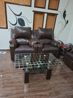i,m selling my sofa set seven seater with table