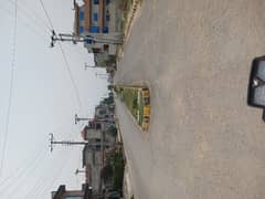 10 Marla Prime Location Residential Plot Three Sided Covered Main 60 Feet Road Is Available for sale.