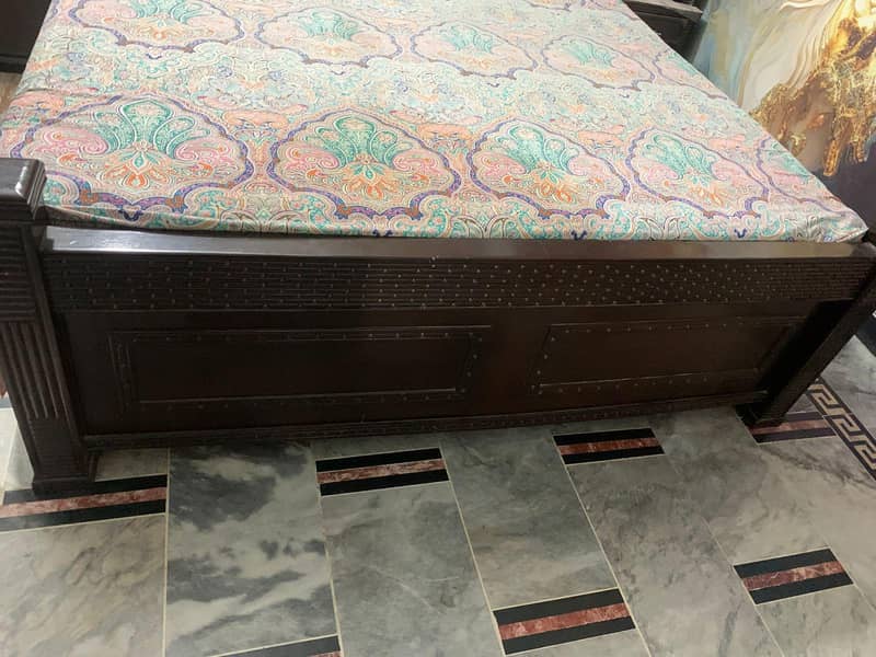 bed with side tables and dressing mirror and spring metress 1