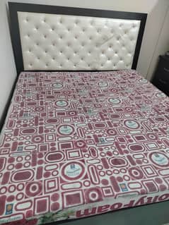 wooden brown bed