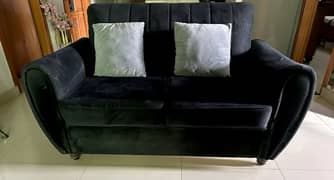 2 seater black sofa with table
