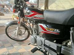 125 new condition phone number 03059797943 Number plate lugi hoi