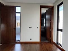 Brand New 10-Marla Masterpiece for Sale in DHA Phase 7 Block Y Immaculate Design, Spacious Rooms, and Modern Luxury with Emarat Real Estates Easy Deal Offer