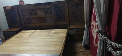 King size bed along with 2 side tables