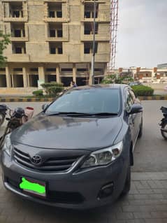 Corolla 2014 gli 1.3  call me 03110117894