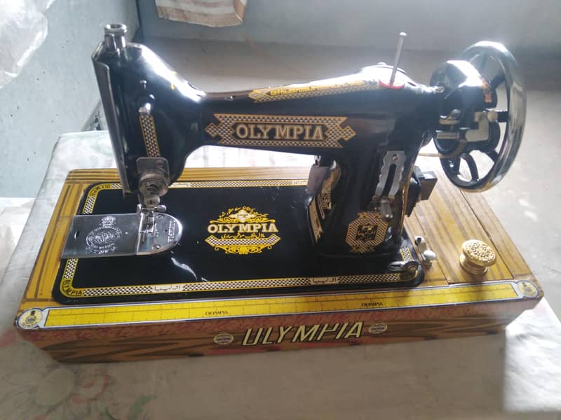 OLYMPIA SEWING MACHINE. 0