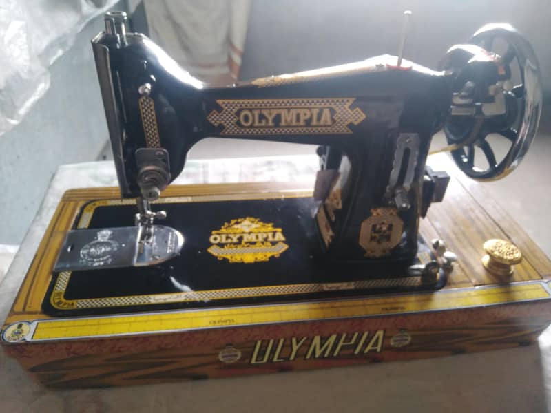 OLYMPIA SEWING MACHINE. 1