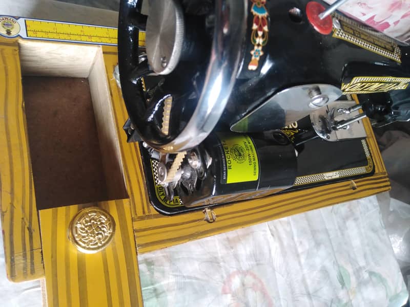 OLYMPIA SEWING MACHINE. 3