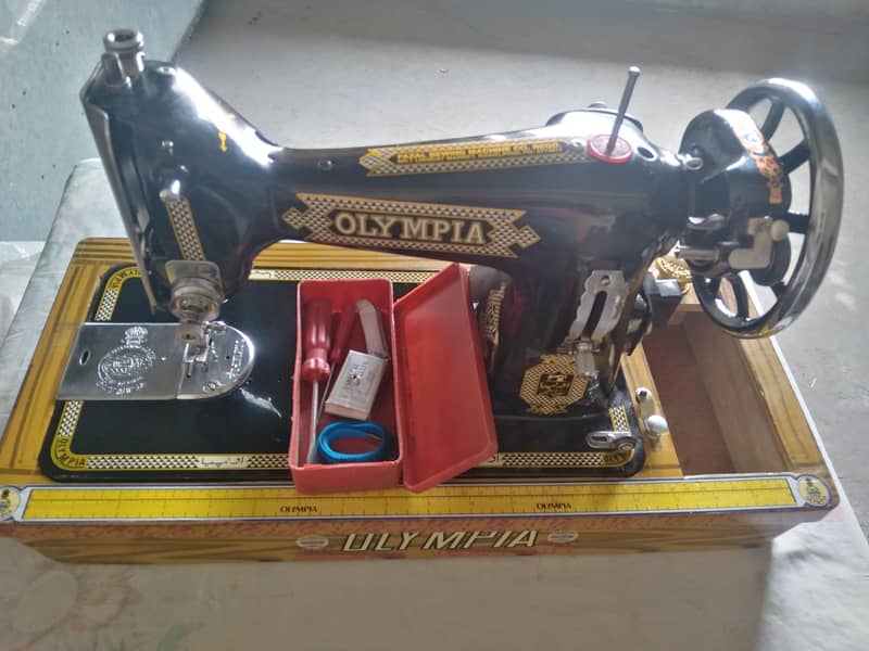 OLYMPIA SEWING MACHINE. 4