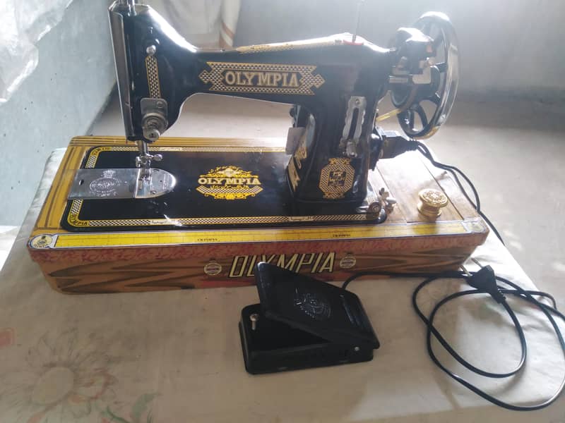 OLYMPIA SEWING MACHINE. 5